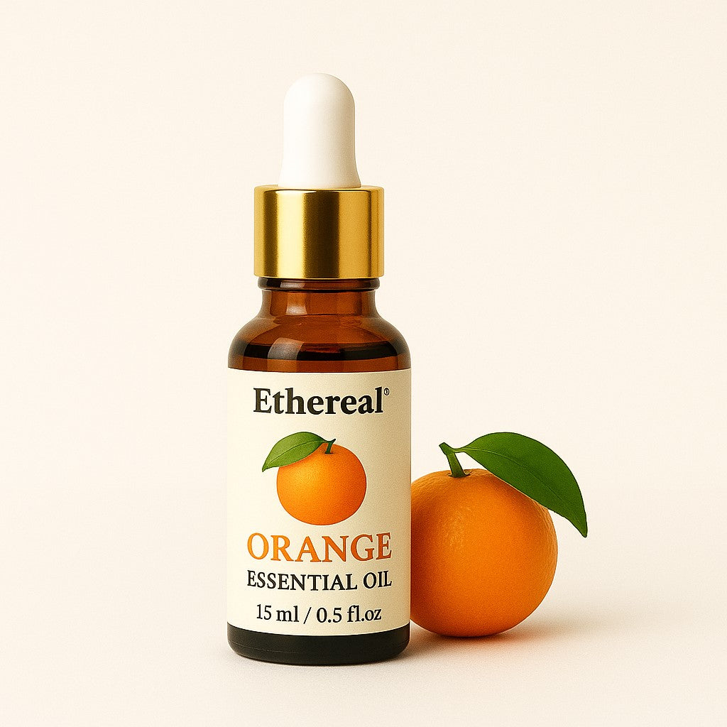 Orange Essential Oil bottle with golden cap and white dropper on off-white background – Shades of Ethereal