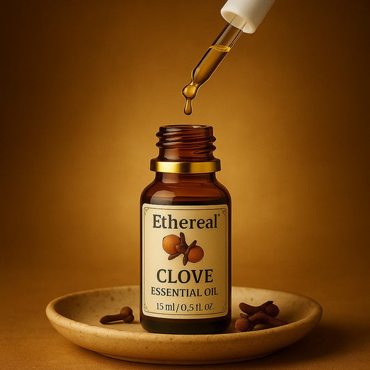 Clove essential oil bottle with dropper, cloves on stone dish – Ayurvedic haircare ritual setup