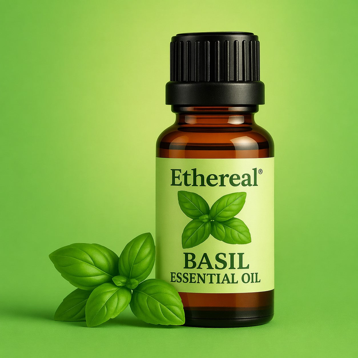 Bottle of Ethereal Basil Essential Oil with basil leaves on a green background