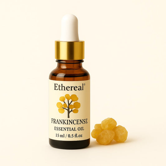Frankincense Essential Oil bottle with golden cap on soft off-white background – Shades of Ethereal”