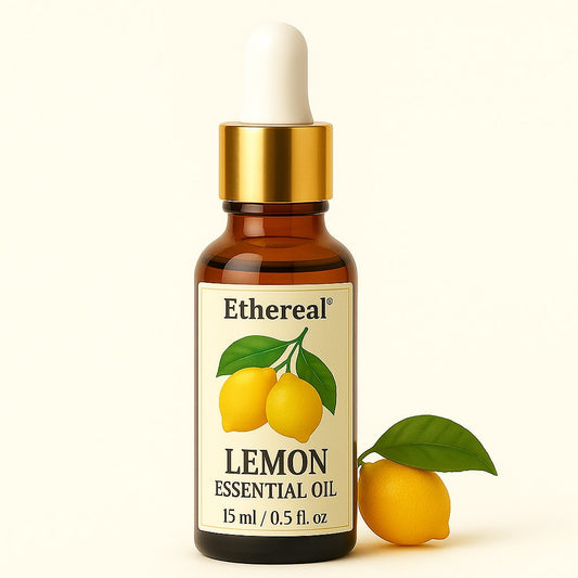 Ethereal Lemon Essential Oil bottle with lemons on a beige background